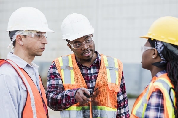 employees discussing workplace safety