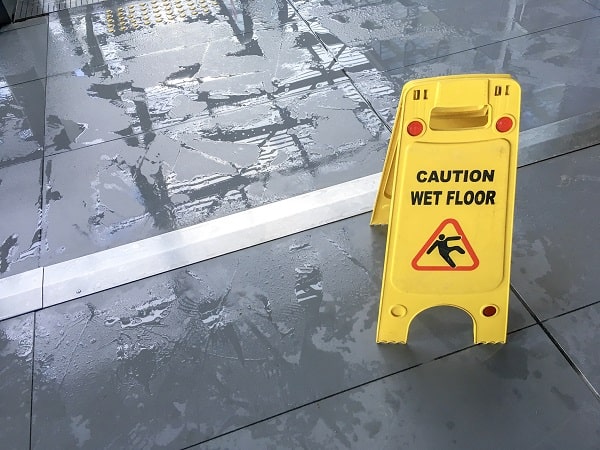 wet floor sign to promote walkway safety in the workplace