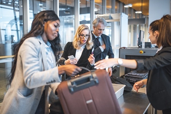 business travelers using cybersecurity tips to stay safe