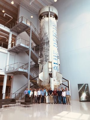 Assure Space team in front of rocket