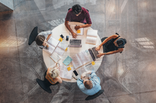 People working on round table